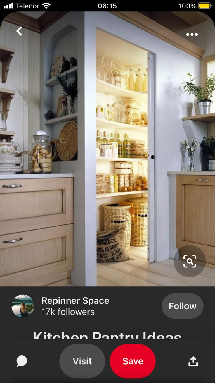 an open refrigerator door in a kitchen next to a sink and counter top with baskets on it