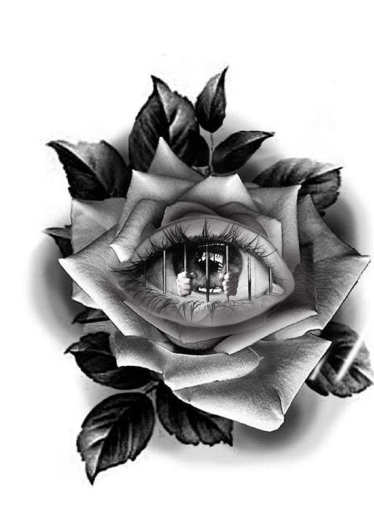 a black and white photo of a rose with an eye in it's center