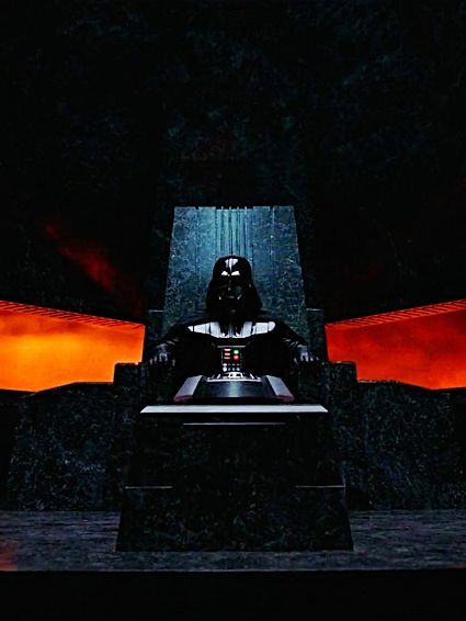 a darth vader sitting in a chair at night