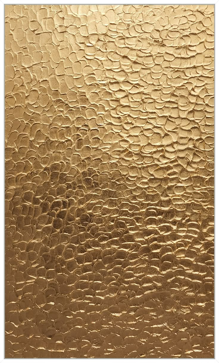 gold foil textured paper with wavy lines on the edges and bottom, as well as an abstract background