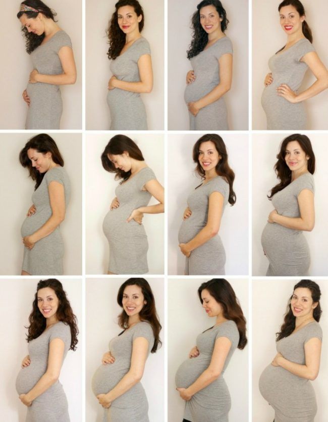 a pregnant woman poses for pictures in her gray dress