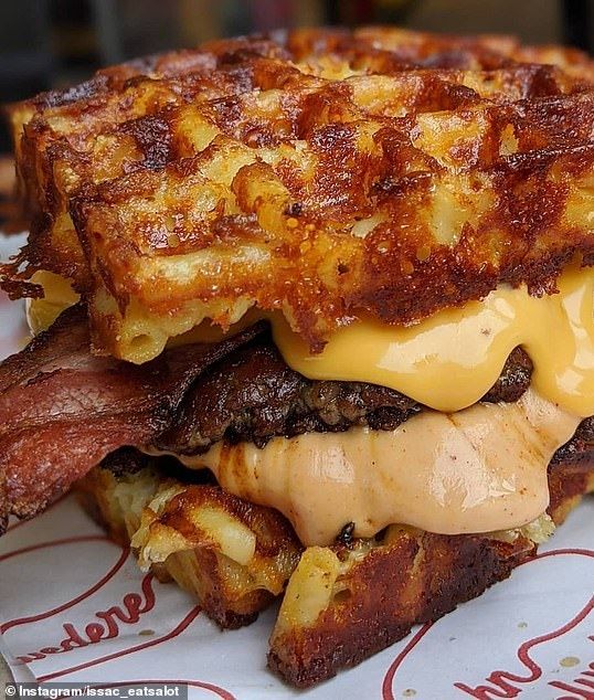 a grilled cheeseburger with bacon and melted cheese