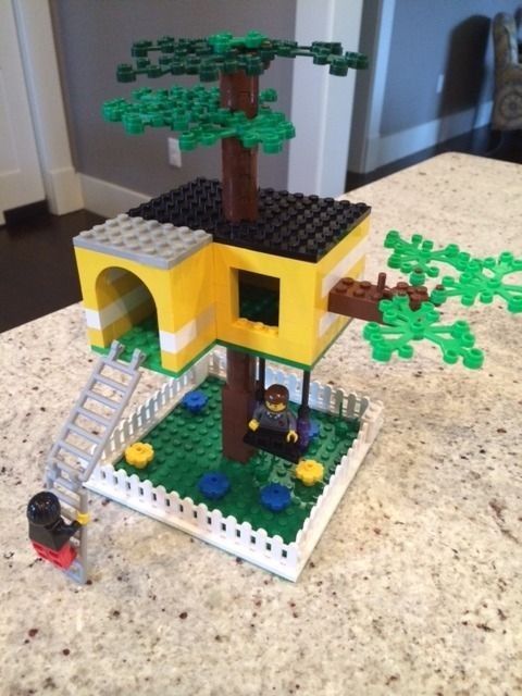 a lego tree house is shown on the counter