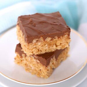 two pieces of cake sitting on top of a white plate