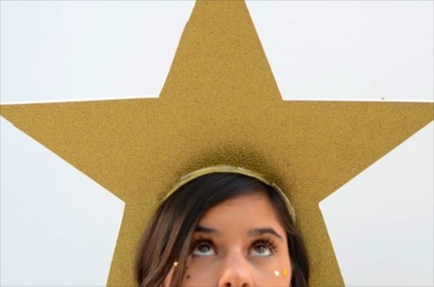 a woman with a star on her head