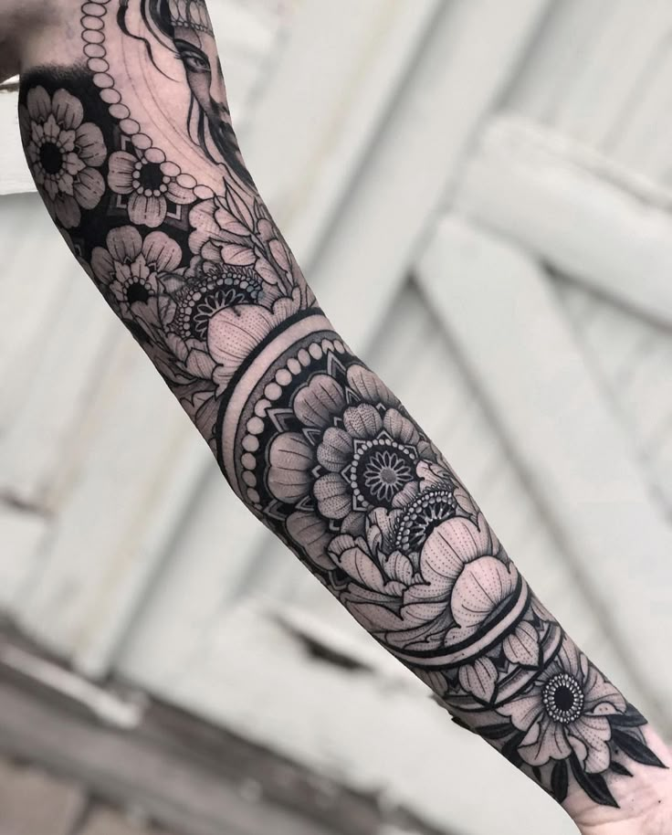 a person with a tattoo on their arm