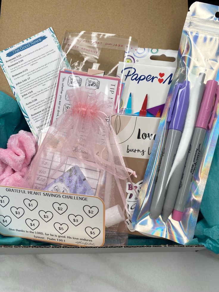 a box filled with lots of crafting supplies