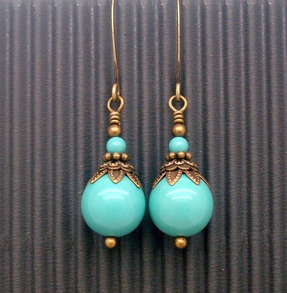 Pearl Earrings Bronze and Green Swarovski Bead by CloudCapJewelry Elegant Patina Earrings, Vintage Turquoise Earrings With Round Beads, Elegant Green Patina Earrings, Vintage Brass Jewelry With Turquoise, Vintage Turquoise Brass Jewelry, Elegant Turquoise Brass Jewelry, Vintage Patina Earrings, Elegant Bronze Jewelry With Patina, Vintage Teardrop Patina Earrings