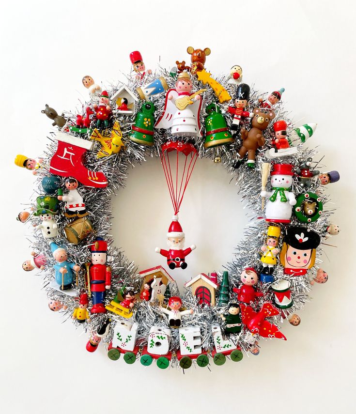 a christmas wreath with many ornaments on it