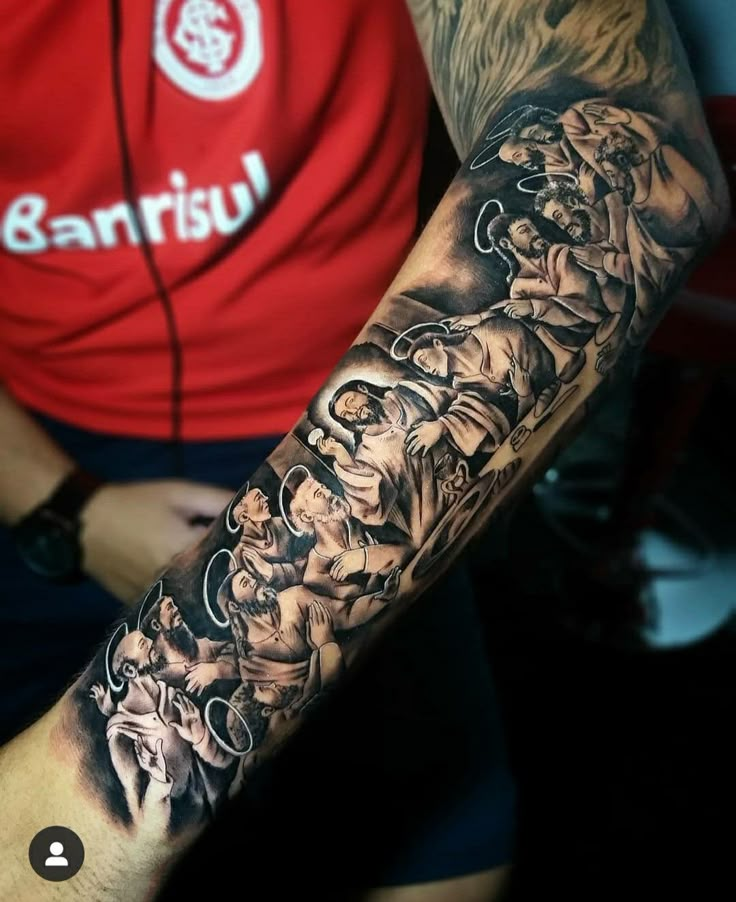 a man with a tattoo on his arm that has many images of people in it