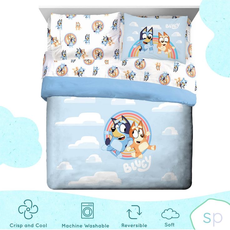 an image of a bed set with cartoon animals on the sheets and pillowcases