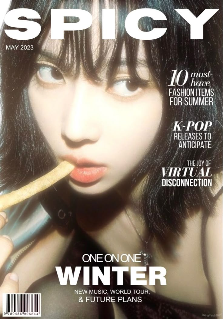 a magazine cover with a woman holding a knife in her mouth and looking at the camera