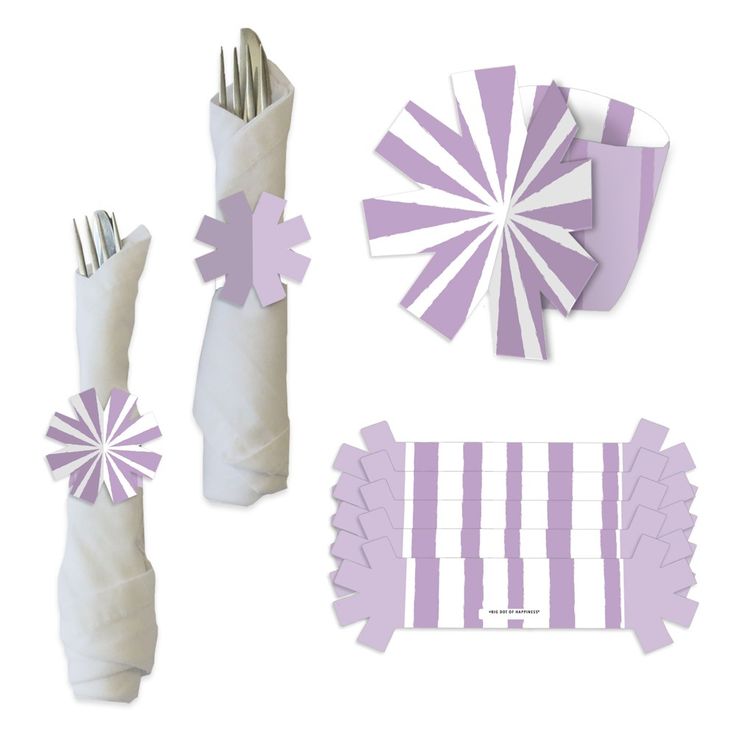 blue and white paper decorations are arranged on top of each other, including napkins