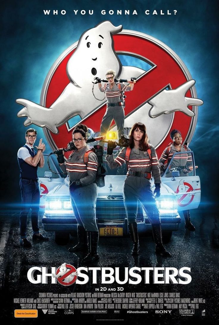 the ghostbus are standing in front of a car