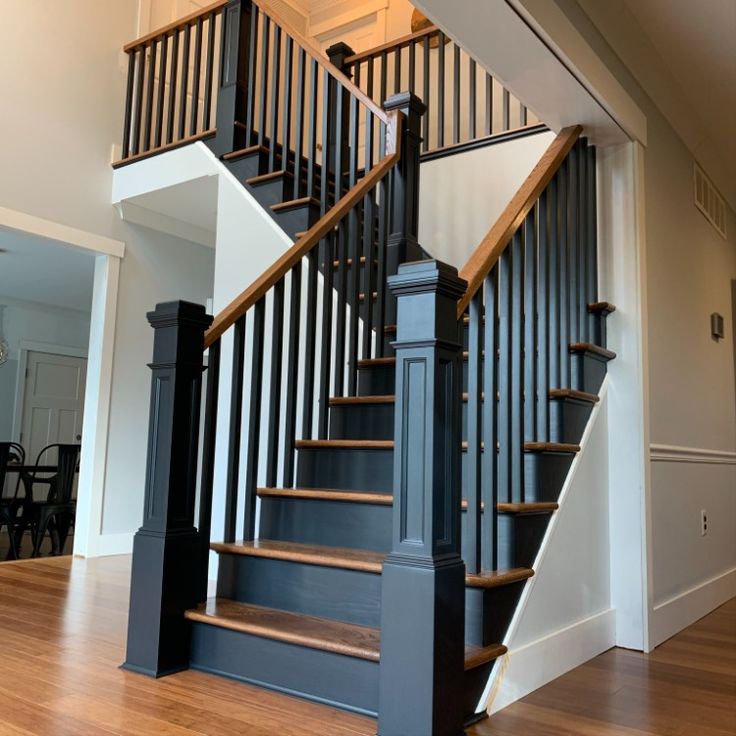 a stair case in a house with wood floors