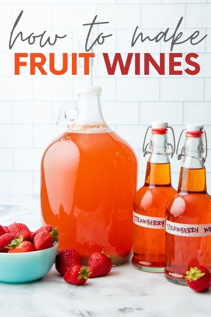 how to make fruit wines in glass jugs with strawberries on the countertop