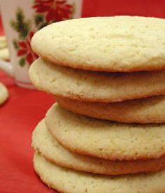 a stack of cookies sitting on top of a red table