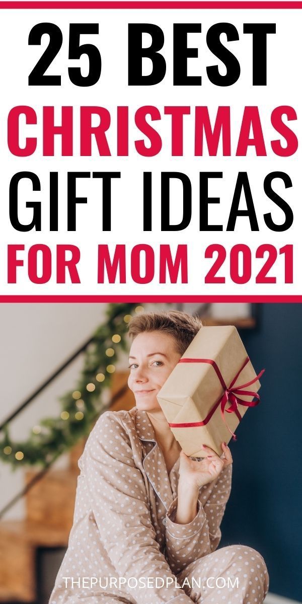 a woman sitting on the floor holding a present box with text overlay that reads 25 friendly christmas gift ideas for mom 2021