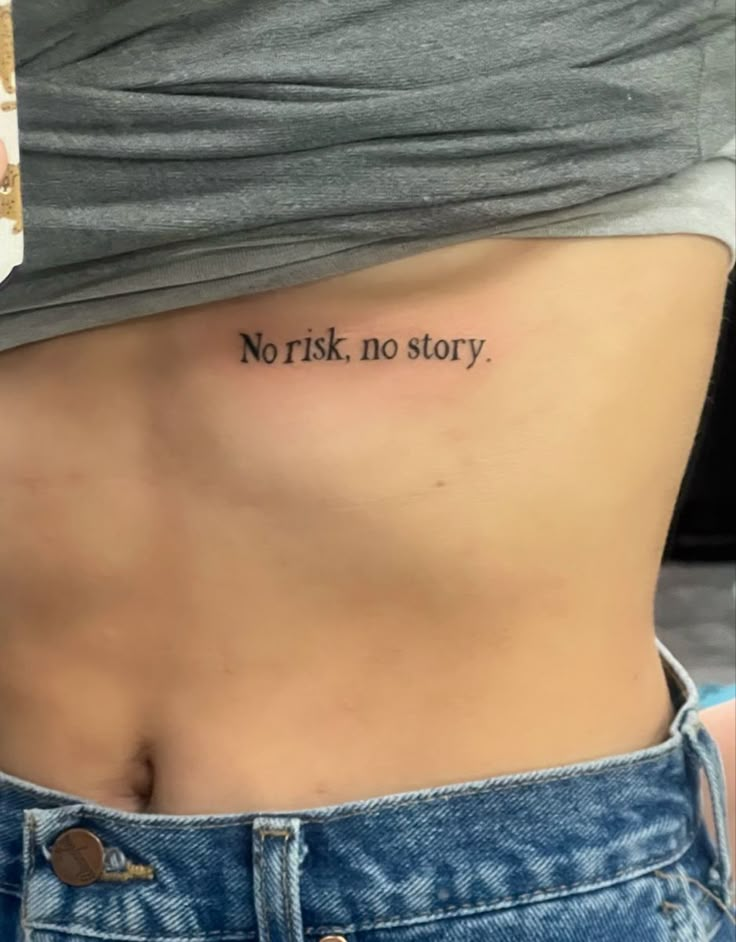 a woman's stomach with the words, norisk no story written on it