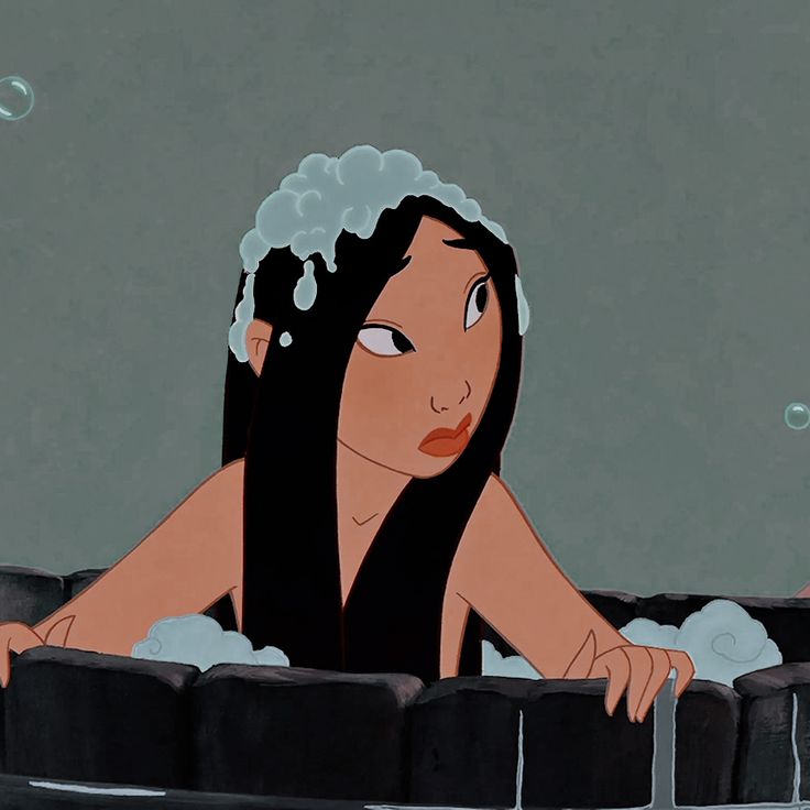 a woman sitting in a bathtub with bubbles coming out of her head and hair