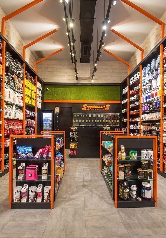 the inside of a grocery store with shelves filled with food and drinks on display for sale