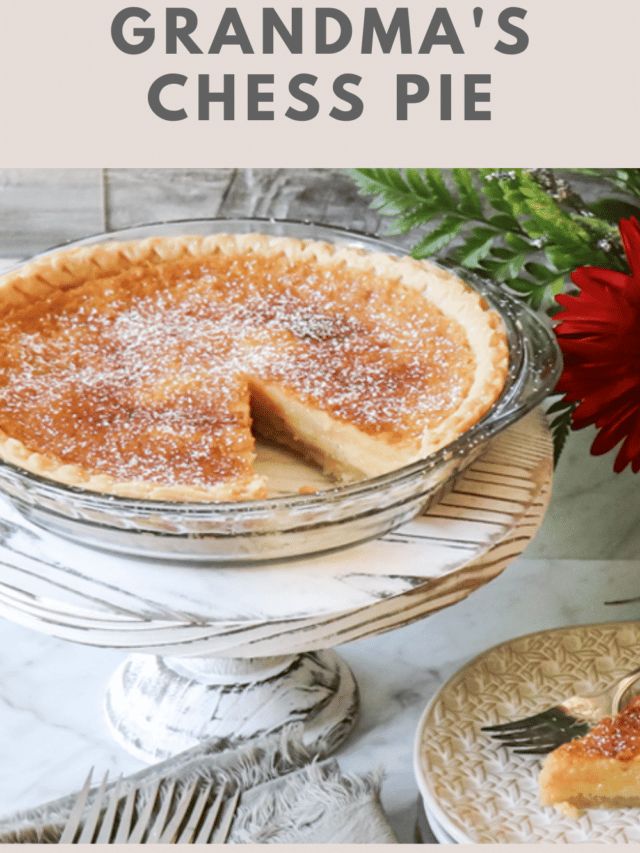 a piece of grandma's cheese pie on a plate with a fork and red flower