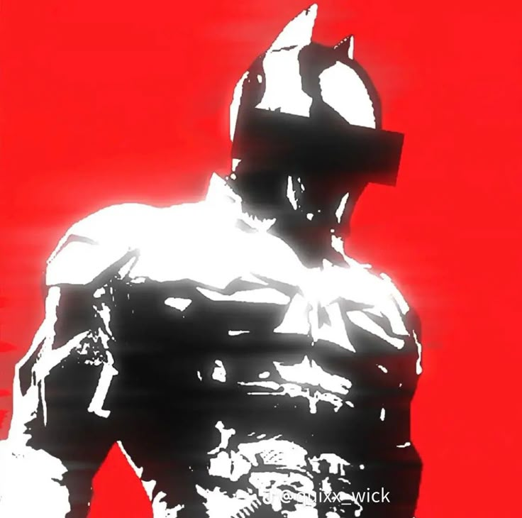 a black and white photo of a man in a batman costume on a red background