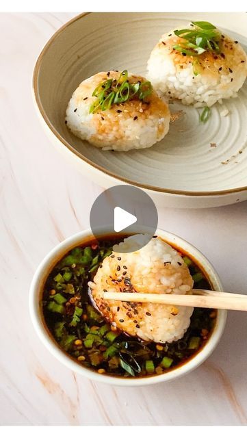 two bowls of food with chopsticks in them on a white counter top next to another bowl filled with rice and vegetables