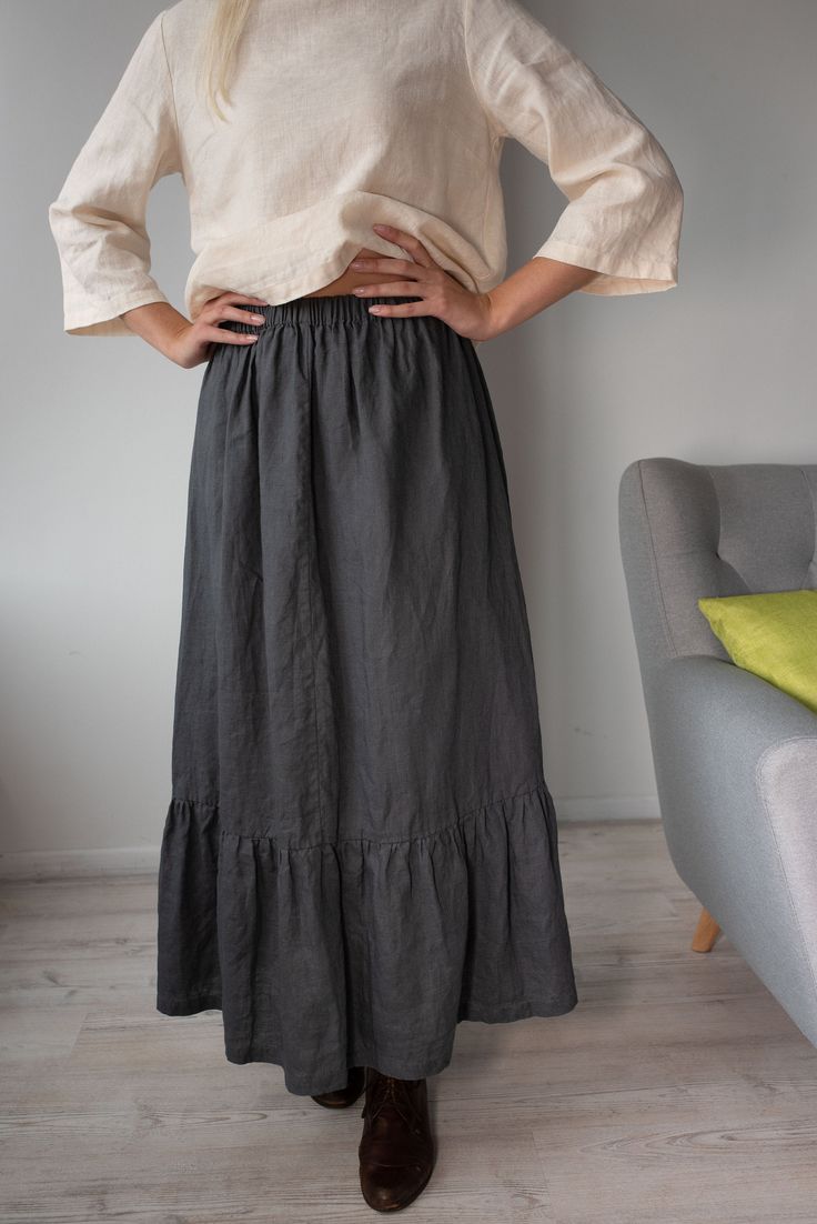 "Long and wide comfortable skirt in pure linen. With bottom frill 12\" (30 cm) high Waist elasticated Skirt length 92.5cm (36.5\") Side pockets - could be added by request Item quality - washed and softened On picture model of size S wears skirt in S size and asphalt-grey color linen Care recommendation: - delicate handwash machine program - gentle detergents and no bleachers - iron if needed while damp. This item made to order average in two weeks. SIZE MEASUREMENTS CHART: SIZE XS; US 0-2; UK 4 Linen Skirt Pattern, Elasticated Skirt, Fall Winter Capsule Wardrobe, Measurements Chart, Comfortable Skirts, Skirt Casual, Boho Skirt, Fall Capsule Wardrobe, Boho Skirts