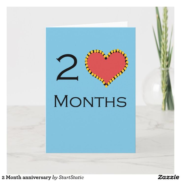 a blue card with the number twenty two months printed on it and a red heart