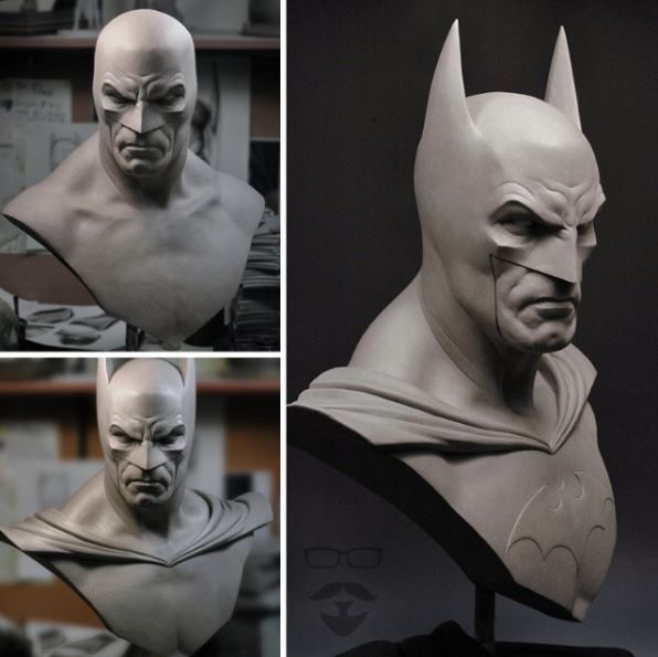 three different angles of a batman busturine