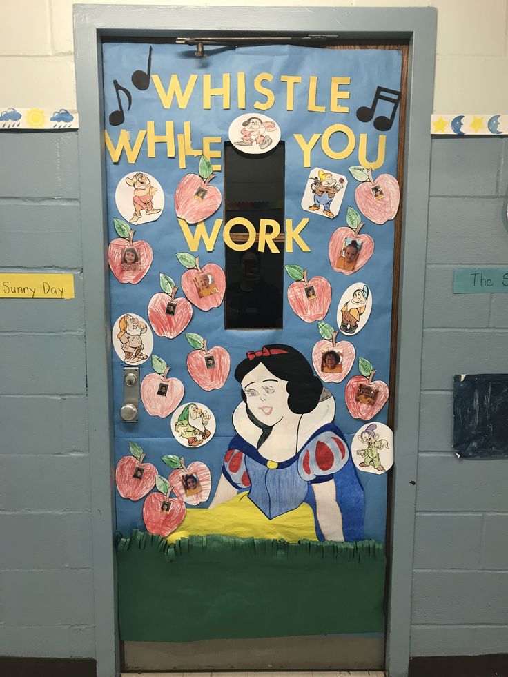 a door decorated with an image of snow white and the words whistle while you work