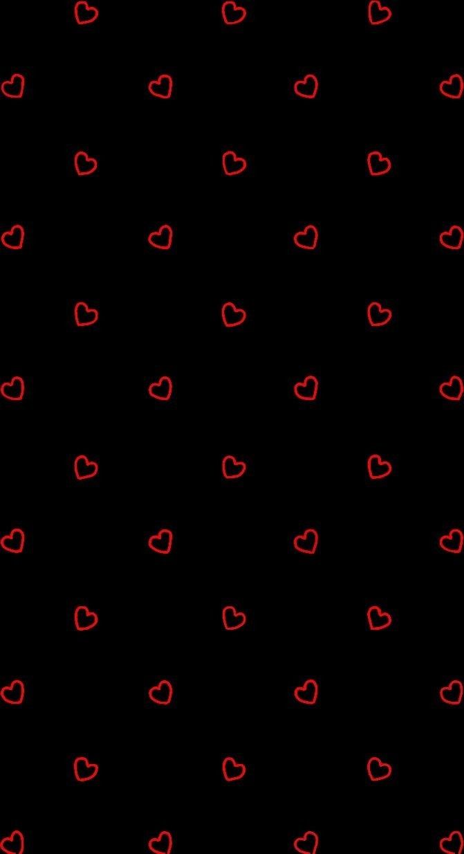 a black background with red hearts on it