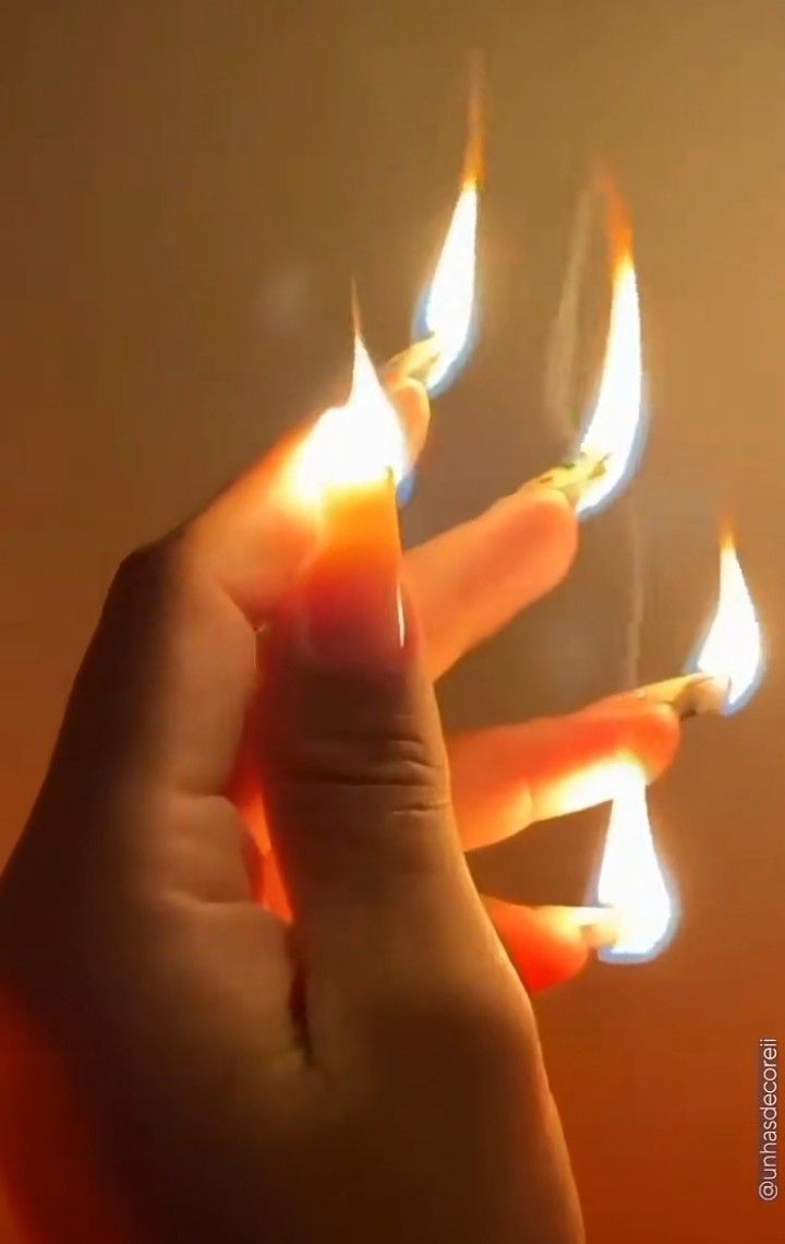 Nails on fire candle fingers flame aesthetic fire aesthetic lite the match light long nails Fire Chaos Aesthetic, Chaotic Fire Aesthetic, Magic Fire Aesthetic, Fire Couple Aesthetic, Different Color Fire, Flowers On Fire Aesthetic, Red Fire Powers, World On Fire Aesthetic, Pretty Fire Aesthetic