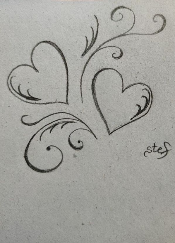 a drawing of two hearts with swirls in the middle