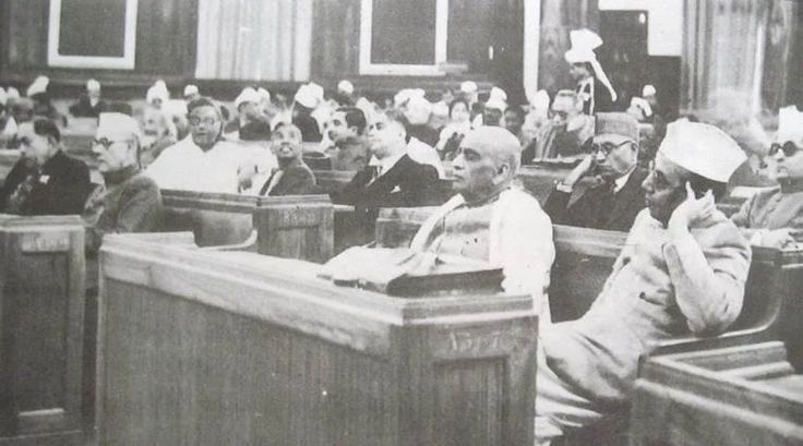 an old black and white photo of people in court