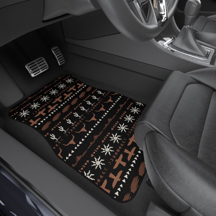 the interior of a car is decorated with black and white snowflakes