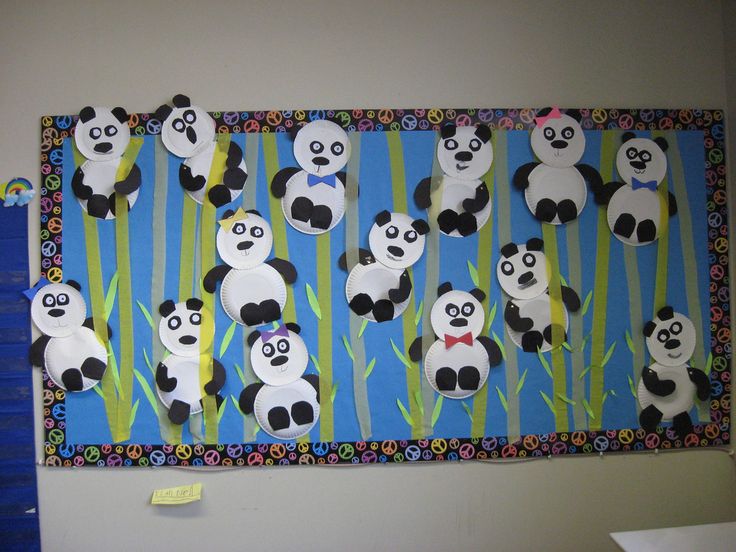 a bulletin board with panda bears on it