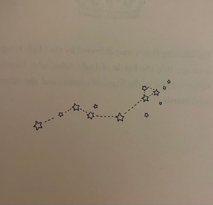 a line graph with stars on it in the shape of a star is shown above an open book