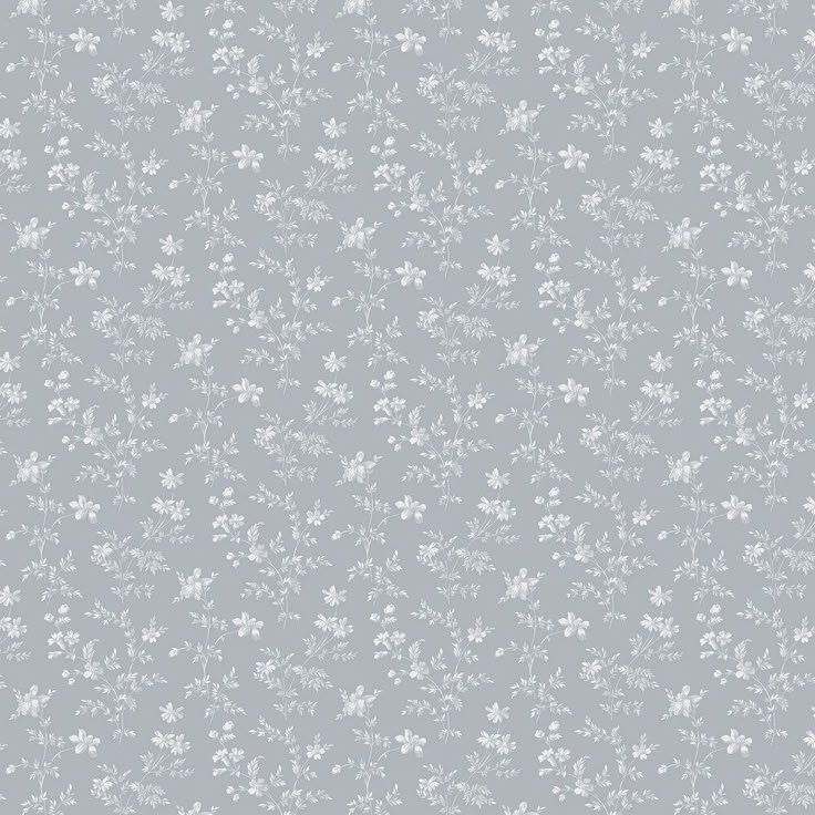 a gray and white wallpaper with small flowers