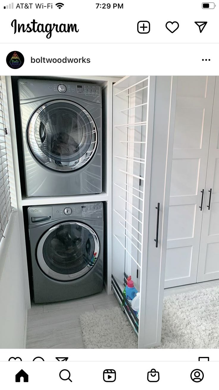 an appliance is displayed on the wall next to a washer and dryer