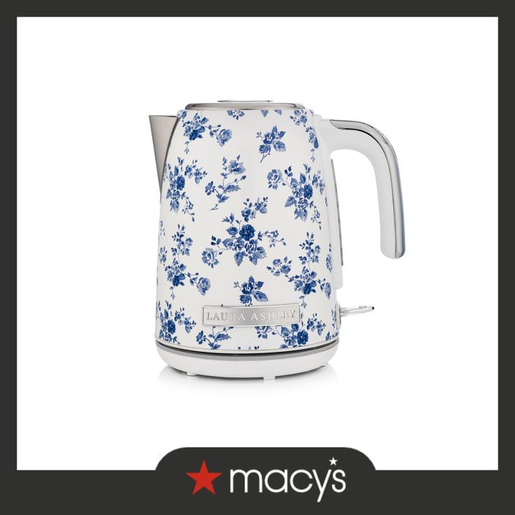 a blue and white floral kettle with the words macy's on it