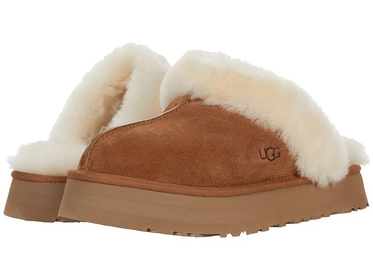 Find UGG Disquette on Editorialist. Elevate your comfort game with the UGG Disquette slipper. Premium construction and materials. Secure and comfortable fit. Slip on mule style. Open back. Cushioned footbed. Fur lined. Real, dyed fur from sheep originating from United States, UK, Spain, Ireland, Australia. Suede leather upper. Sheepskin collar, lining, and footbed. Synthetic outsole. Imported. Ugg Platform Slippers, Ugg Platform, Ugg Coquette, Ugg Style, Chestnut Color, Slide Slippers, Suede Slippers, Ugg Slippers, Platform Slippers