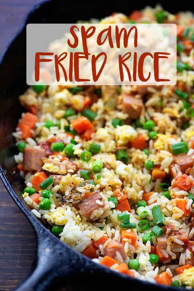 spam fried rice in a skillet with peas and carrots