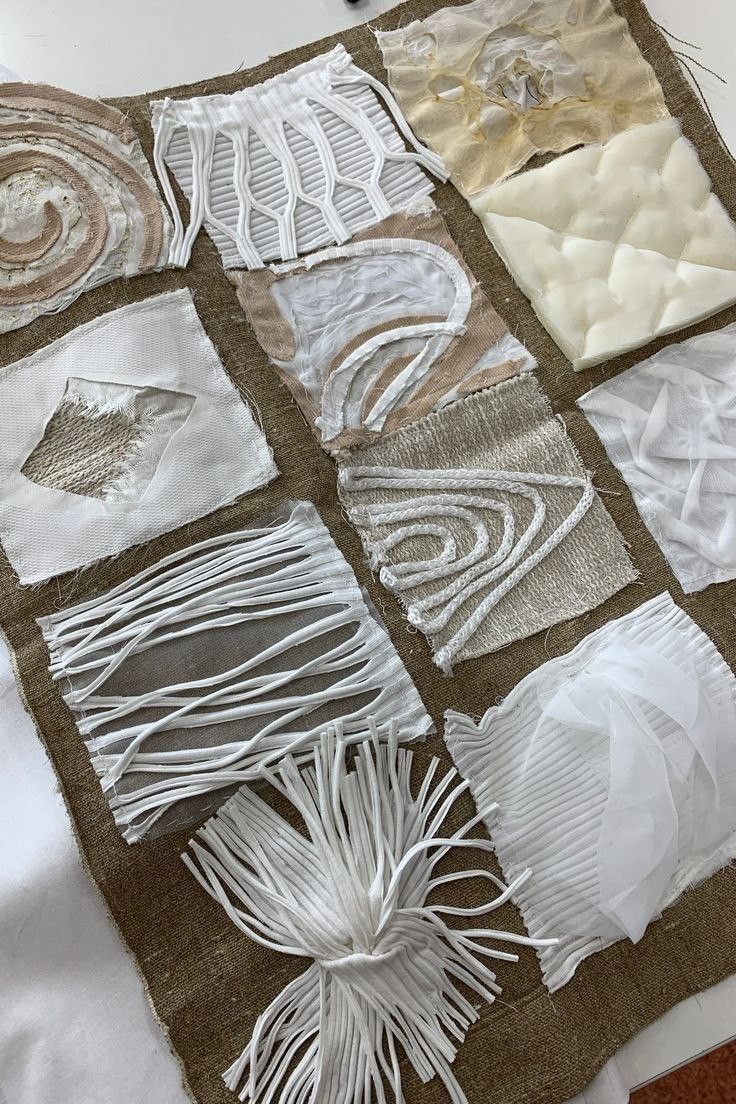 a quilt made with white and brown material