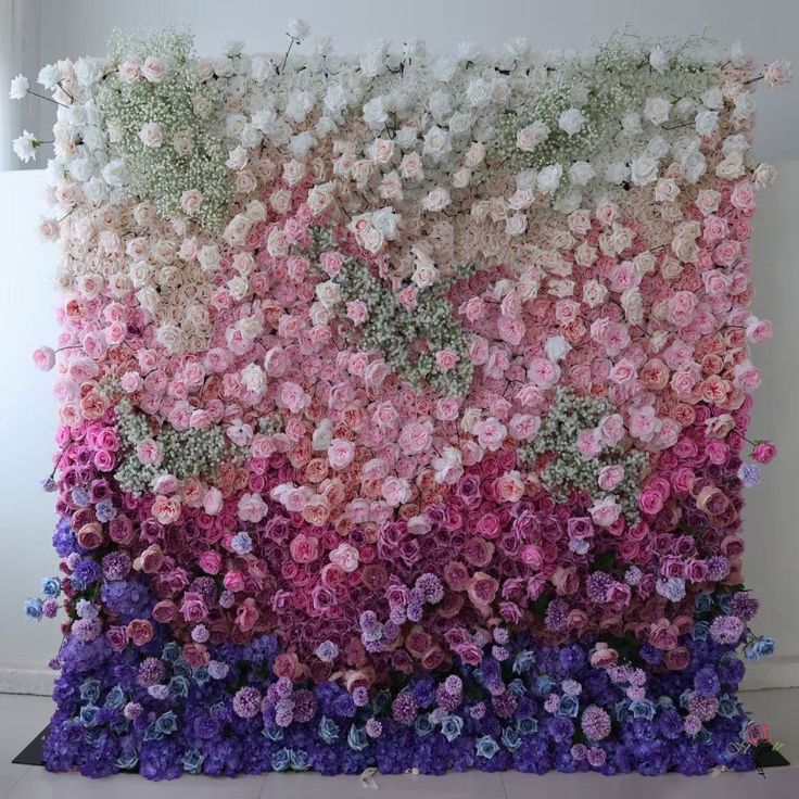 a large flower wall with flowers on it