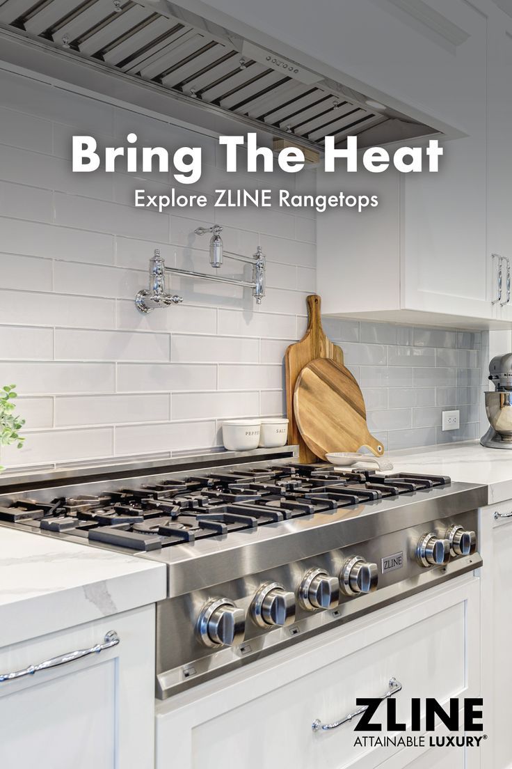 a stove top oven sitting inside of a kitchen next to a cutting board and wooden utensils