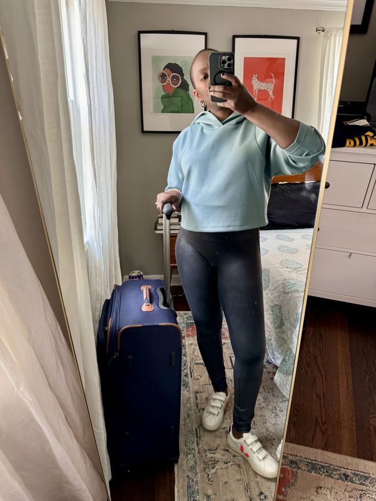 How to create an easy, simple & chic look for your international flight. | #TheMomEditStyle #FashionBlog #AirportStyle #TravelOutfit #Hoodie #Spanx #FauxLeatherLeggings #Sneakers International Flight, Cute Looks, Travel Outfits, Simple Chic, Chic Look, Swim Shop, Faux Leather Leggings, Airport Style, Travel Outfit