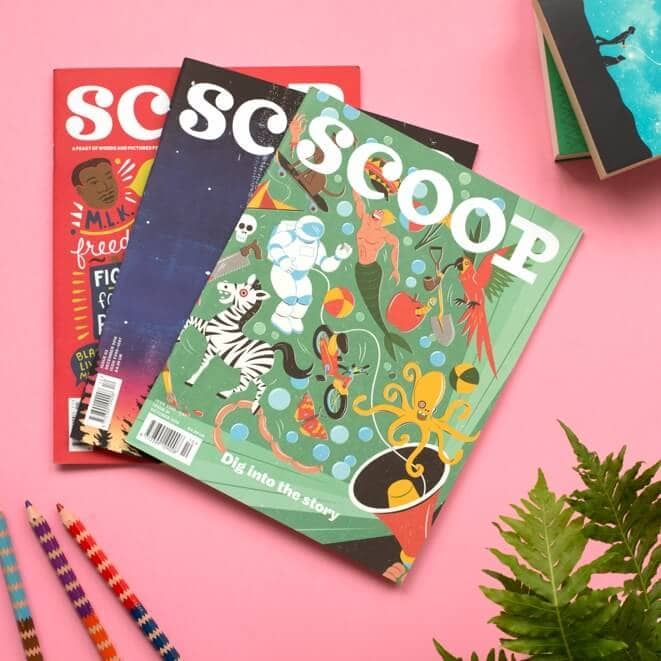 three children's books on a pink surface with pencils next to them and some plants