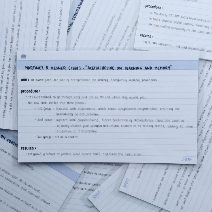 a pile of papers with writing on them